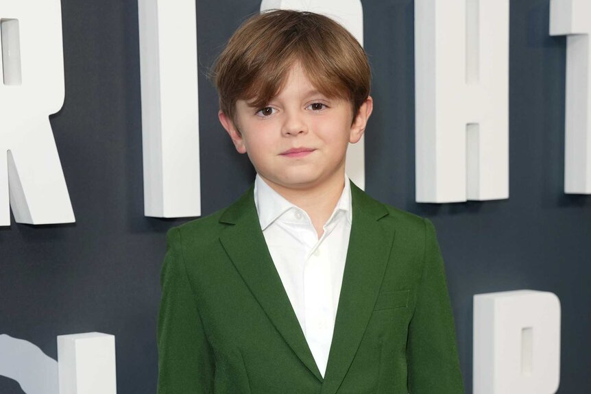 Callum Vinson smiling and posing at the New York premiere of Long Bright River.