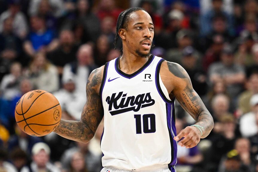 DeMar DeRozan dribbling the ball during a game against the Utah Jazz.