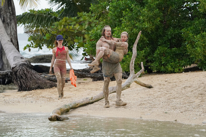 Parvati Shallow, David Genat, and Courtney "CK" Kim on a beach in Deal or No Deal Island Season 2, Episode 9.