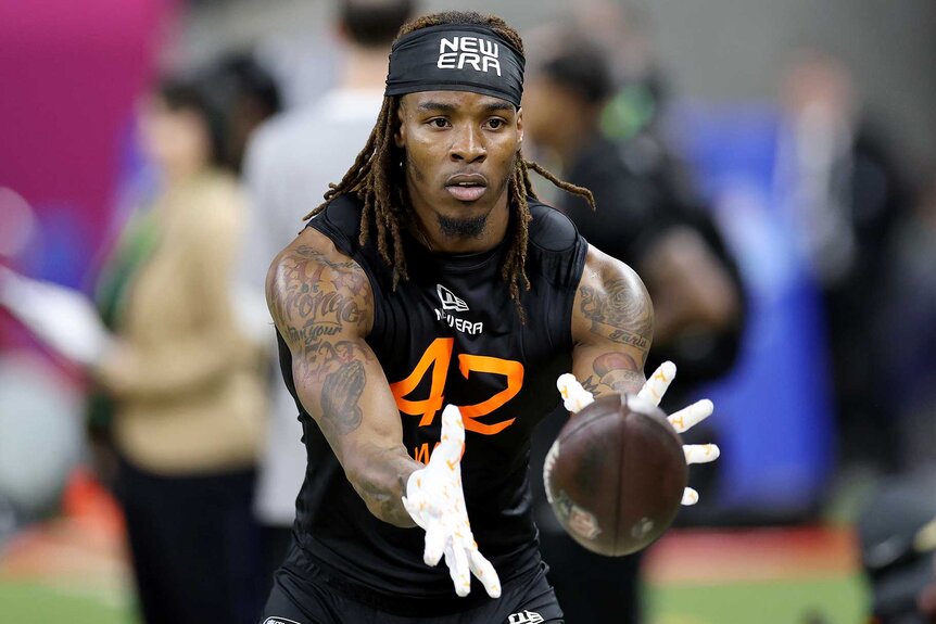 Dont'e Thornton Jr. catching a ball during a drill for the NFL Scouting Combine.