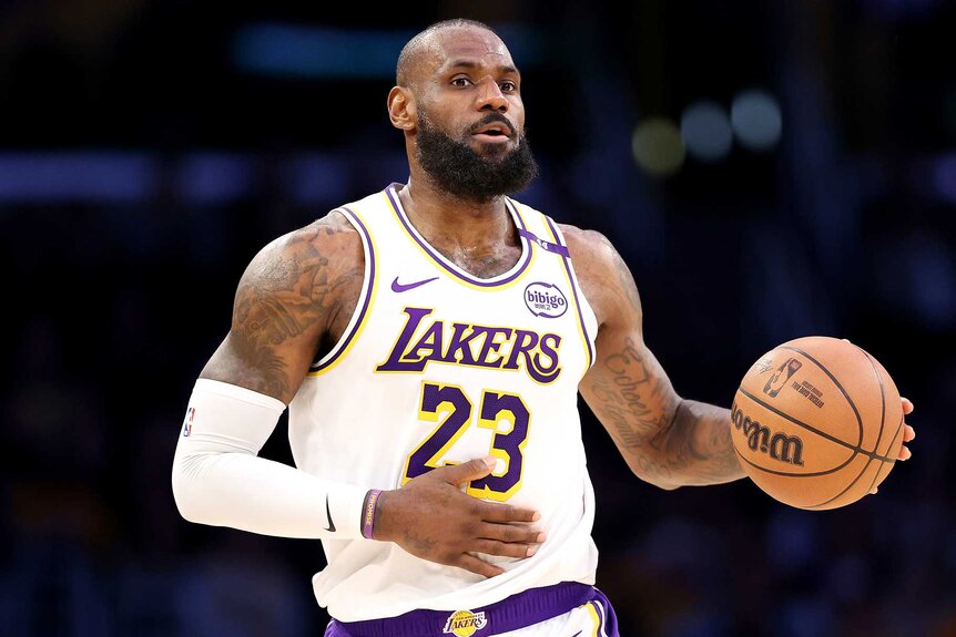 Lebron James dribbling the ball during a game against the LA Clippers.