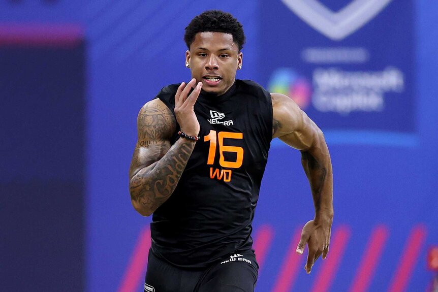 Matthew Golden running during a drill for the NFL Scouting Combine.