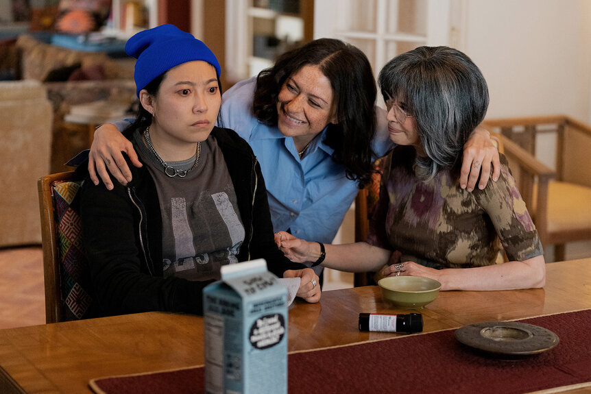 Awkwafina, Alia Shawkat and Lauren Tom hug each other on Poker Face Season 2